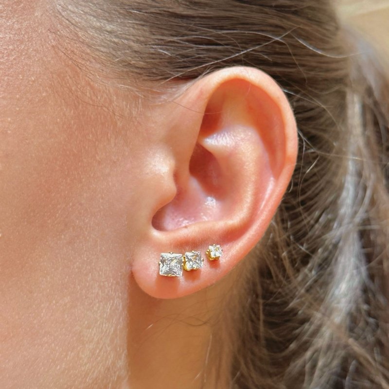 BRINCO TRIO ZIRCONIA QUADRADA 1°2°3°FURO // QTDE PCT: 5 PAR // VAL UNIT: R$ 7,20