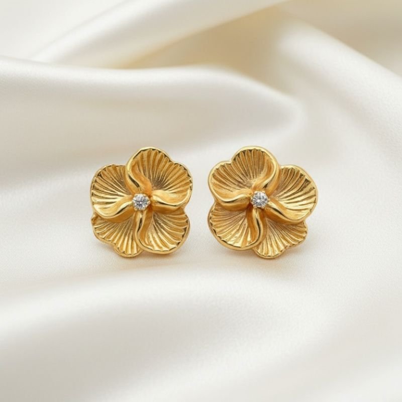 BRINCO DE FLOR COM ZIRCONIA // QTDE PCT: 5 PAR // VAL UNIT: R$ 5,30