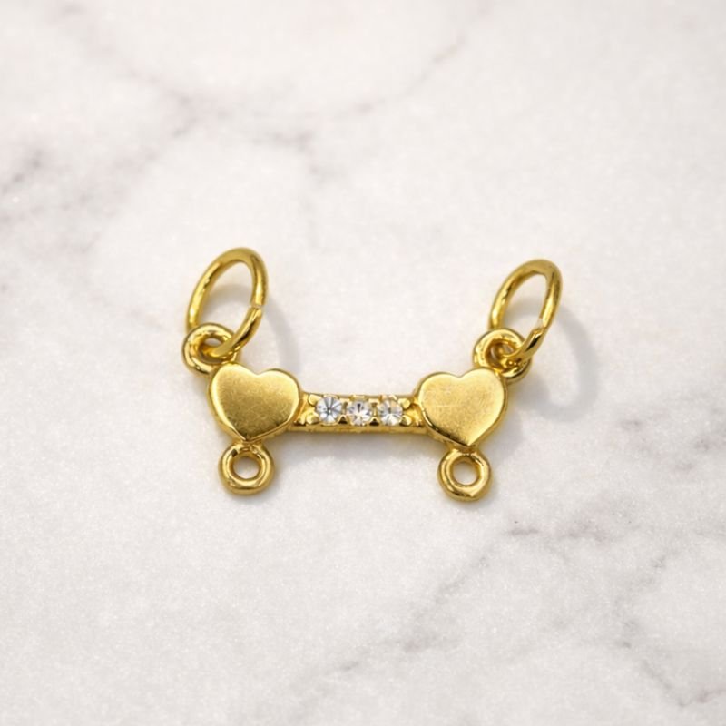 PINGENTE DE CANGA DE 2 COM ZIRCONIA // QTDE PCT: 5 PC // VAL UNIT: R$ 4,84